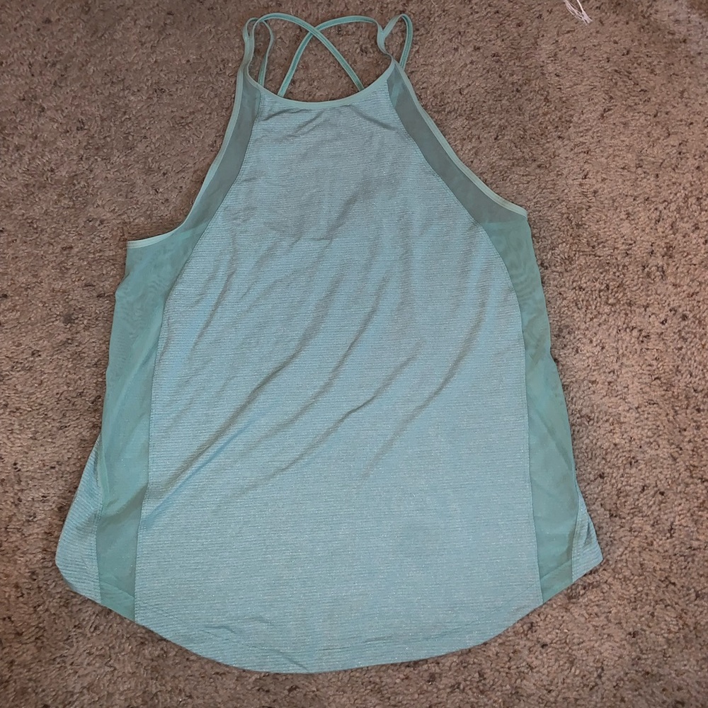 Lululemon size 8 turquoise tank top with cross back and side mesh ✨